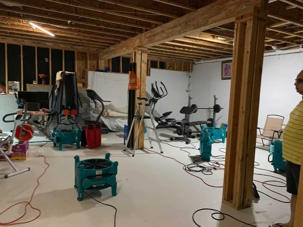 Basement drying equipment setup for Contents Cleaning & Restoration in Cedar Lake